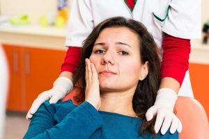 Girl having Dental Pain