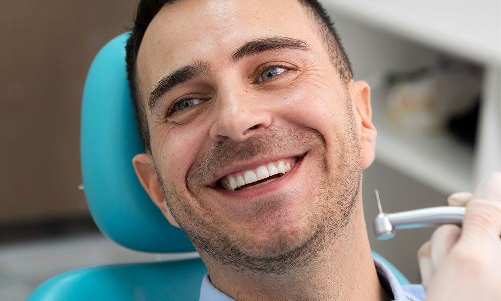 Patient getting a permanent custom smile with dental implants